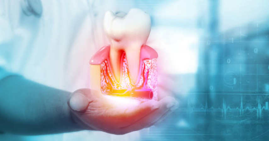 Tooth with light flashing through it, demonstrating gum disease, cavities, and general oral hygiene